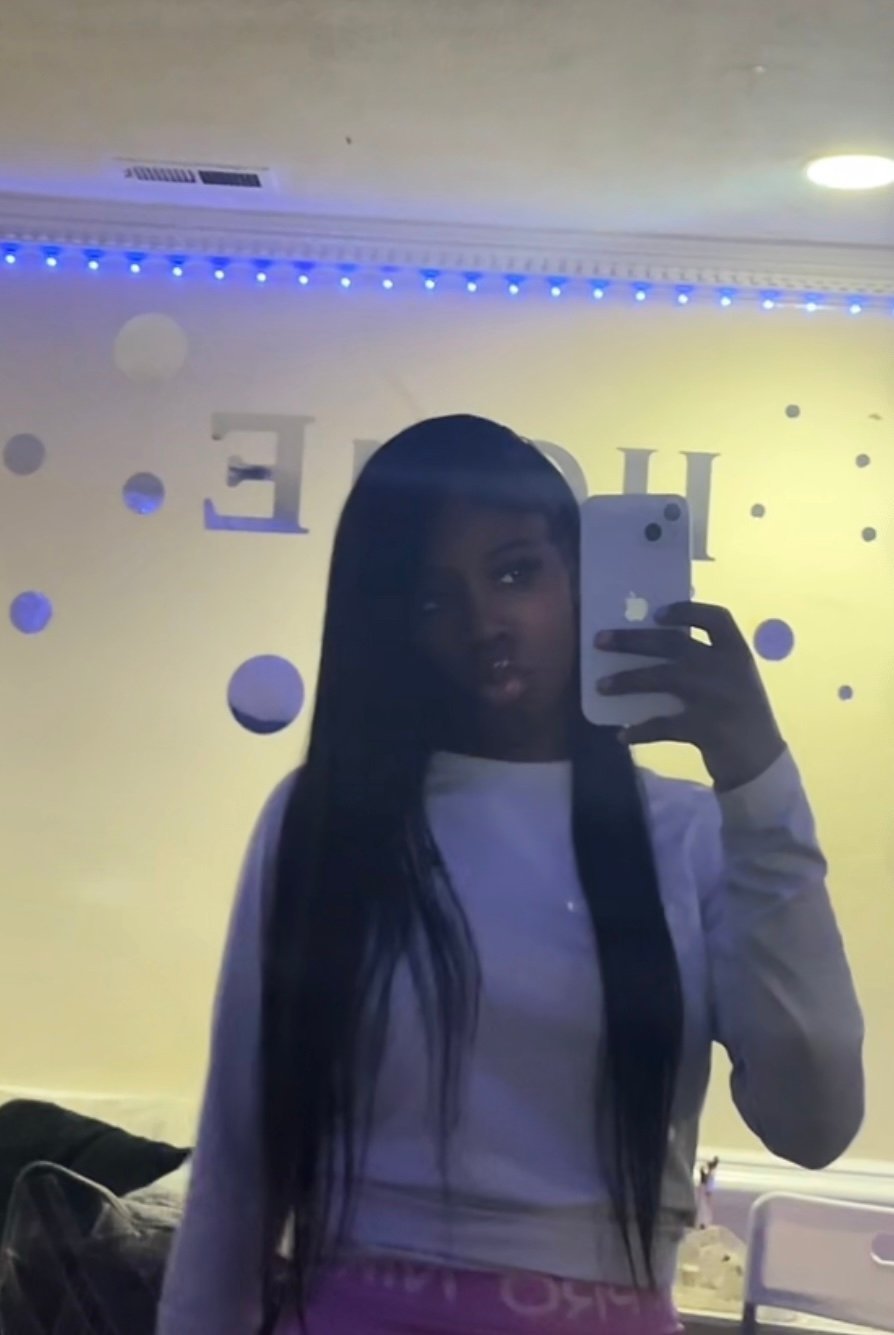 Mirror selfie with yellow wall and blue LED lights